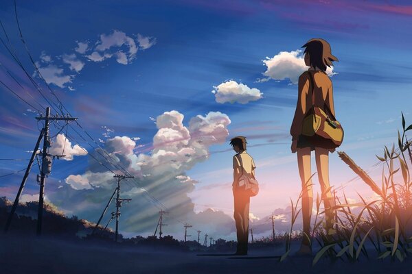Dos personajes de anime contra el cielo