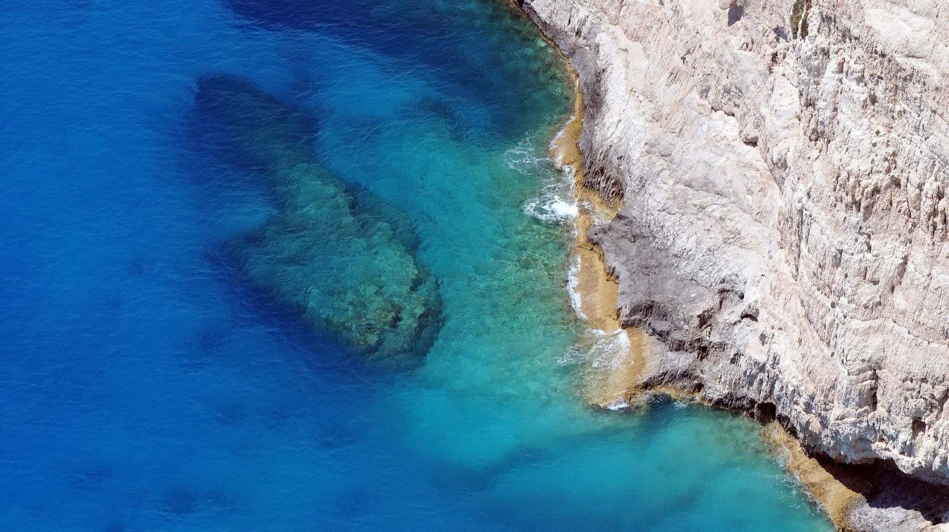 acantilado acantilado roca de piedra agua azul altura mar fondo resaca costa superficie naturaleza especie isla piedras