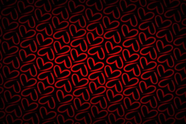 Textura con corazones rojos sobre fondo oscuro