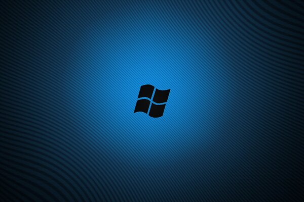El logotipo de windows brilla sobre un fondo azul