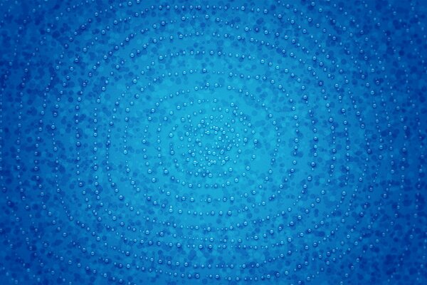 Gotas redondas sobre fondo azul