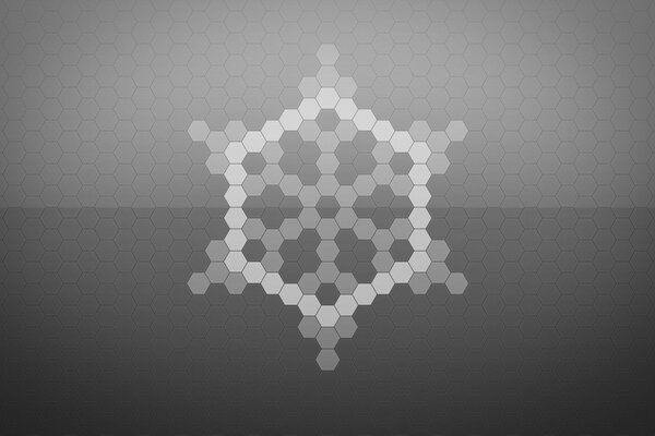 Patrón abstracto de copo de nieve sobre fondo gris