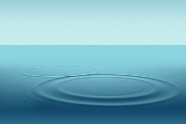 Círculos en el agua que crean ondas