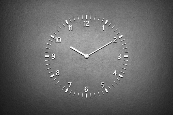 Esfera del reloj sobre fondo gris