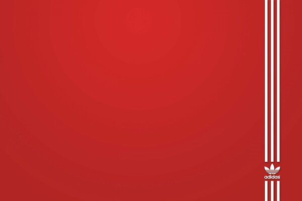 Logotipo de Adidas sobre fondo rojo