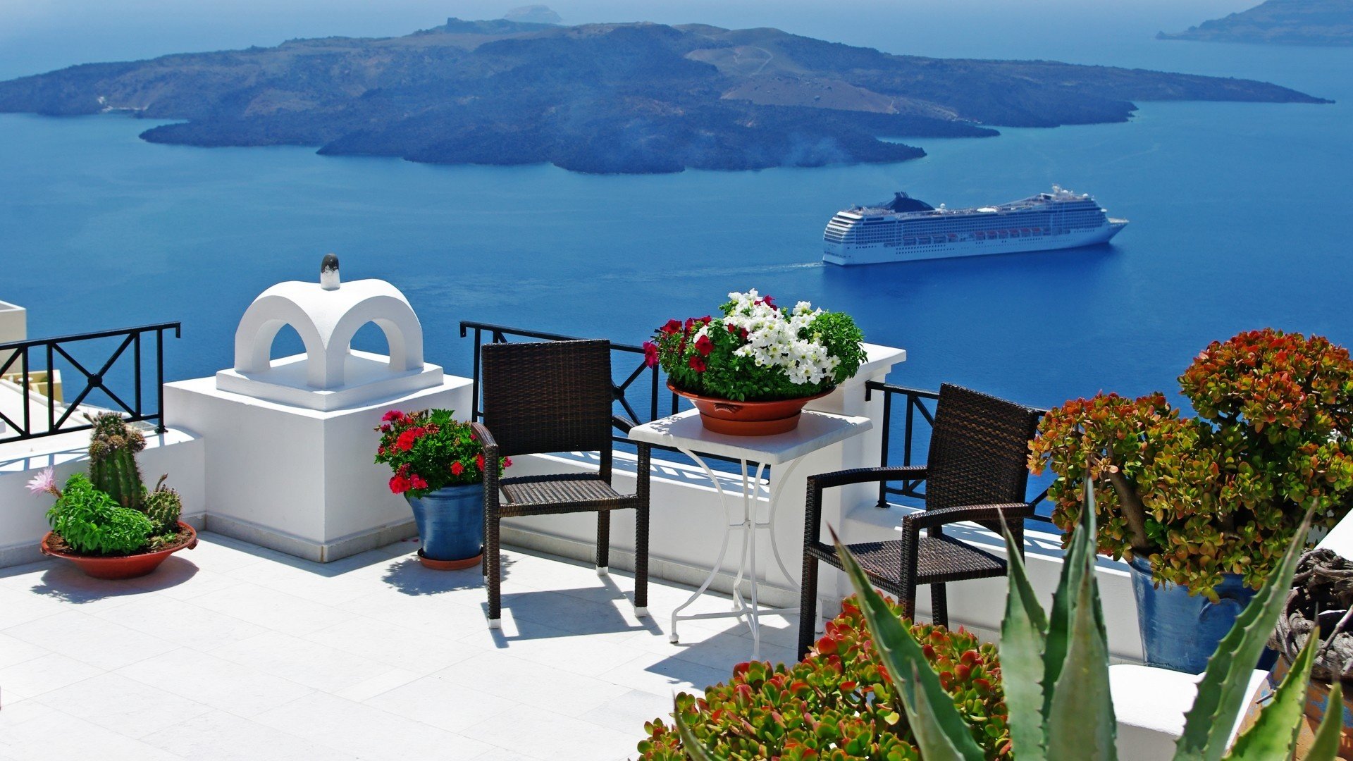 grecia santorini mar egeo oia noche ciudad linternas iglesia cúpula casas