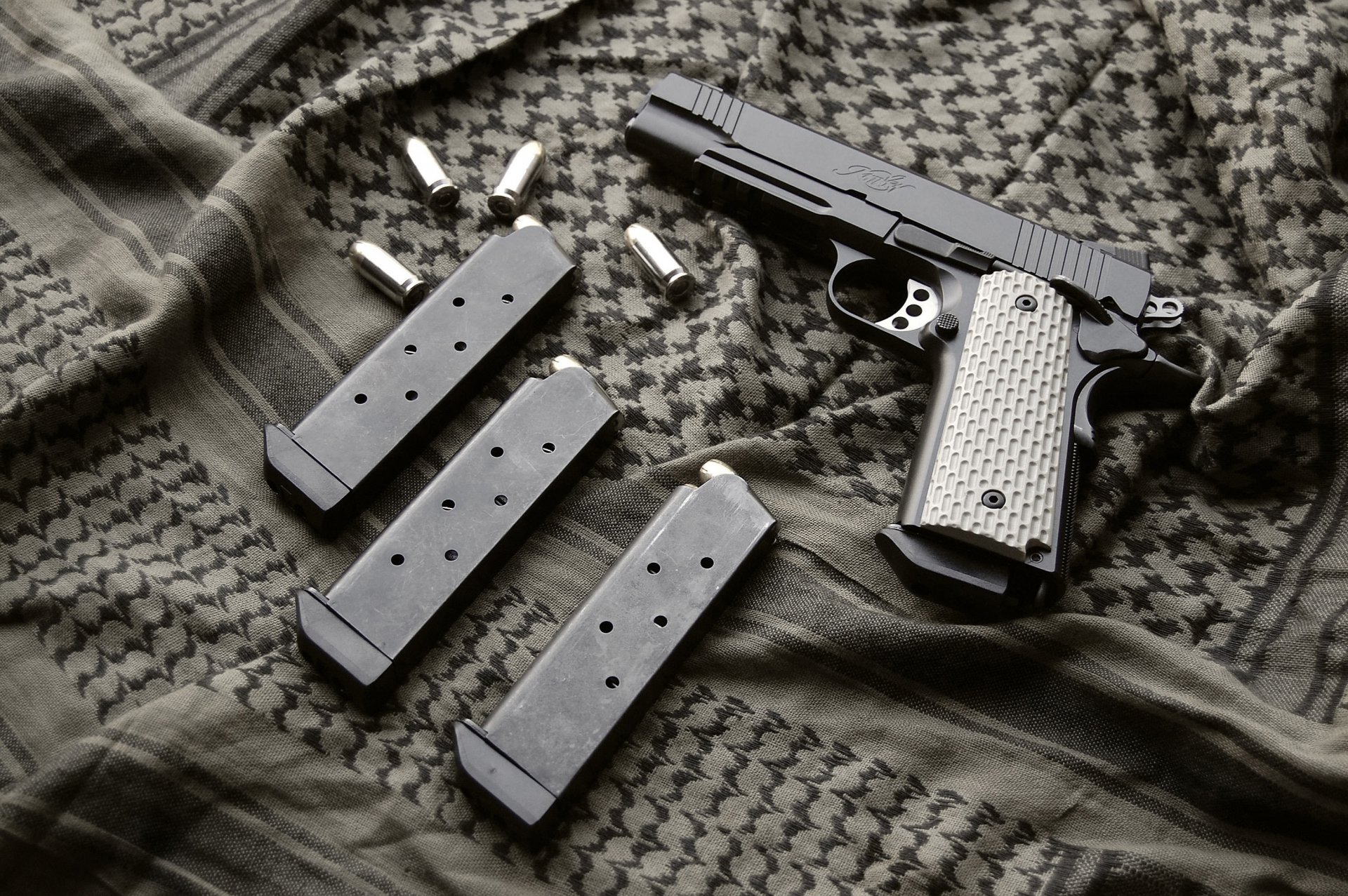 orden de kimber 1911 pistola armas tiendas tela