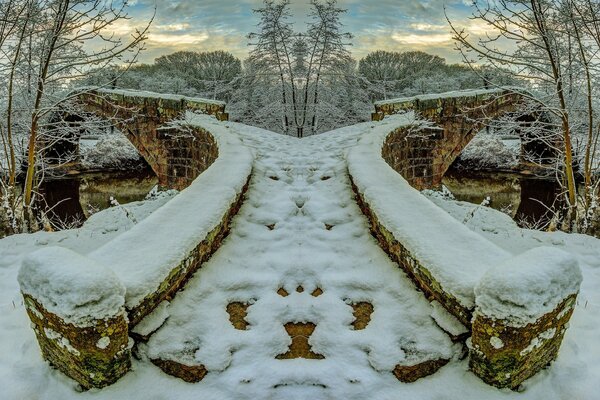 Puente de piedra de invierno. Cuento de nieve